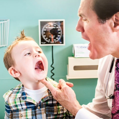 A doctor providing healthcare to a child